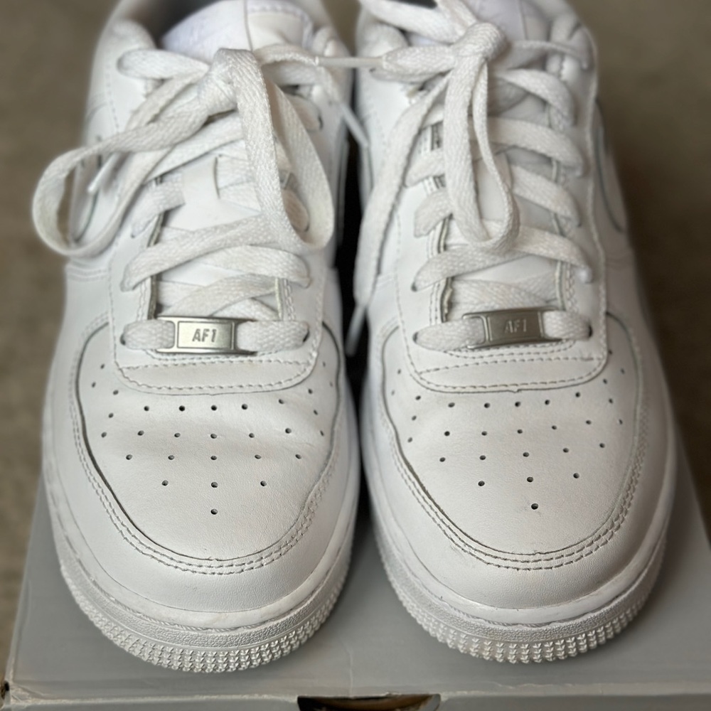 Authentic grade school white Air Force 1s.